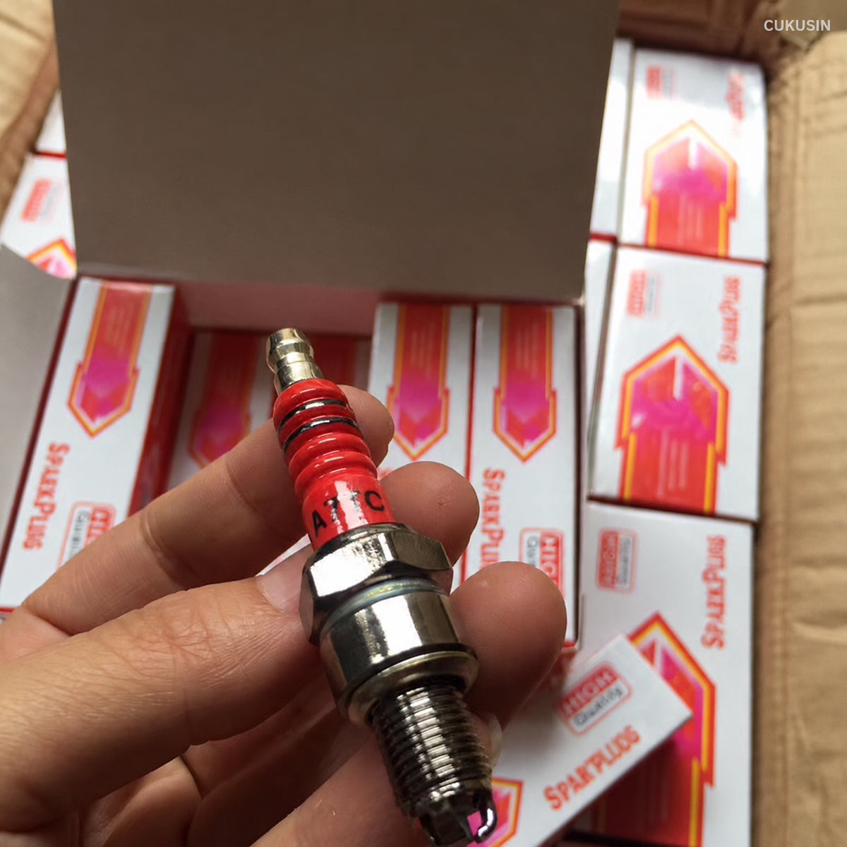 Motorcycle GY6 50cc 150cc high-performance 3-electrode spark plug, red triple electrode spark plug — CUKUSIN logo image